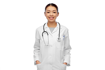 Image showing happy smiling asian female doctor in white coat