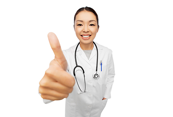 Image showing smiling asian female doctor showing thumbs up