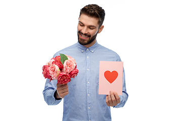 Image showing happy man with flowers and valentine's day card