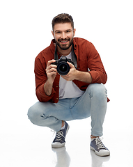 Image showing smiling man or photographer with digital camera