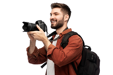 Image showing happy man or photographer with camera and backpack