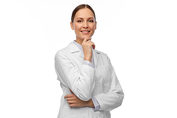 Image showing thinking female doctor or scientist in white coat