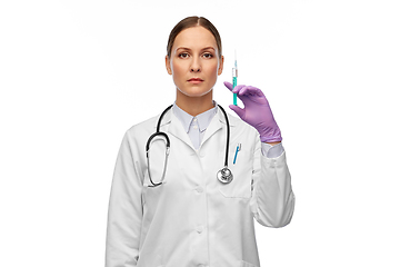 Image showing female doctor with medicine in syringe