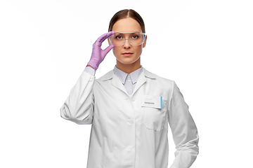 Image showing female scientist in goggles and gloves