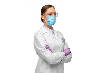 Image showing female scientist in medical mask and goggles