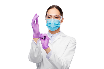 Image showing female doctor in gloves, mask and goggles