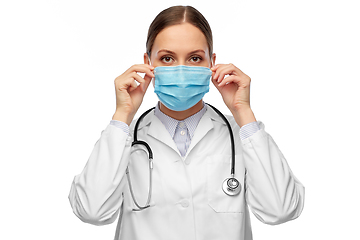 Image showing happy female doctor wearing medical mask