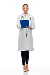 Image showing happy female doctor with clipboard and stethoscope