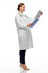 Image showing happy smiling female doctor with clipboard