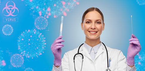 Image showing happy female doctor with test tube and cotton swab