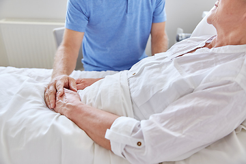 Image showing senior couple meeting at hospital ward