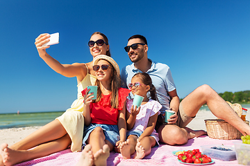 Image showing happy family taking selfie on summer beach