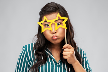 Image showing asian woman with star-shaped party glasses