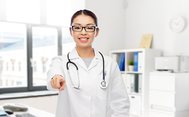 Image showing asian female doctor pointing to you at hospital