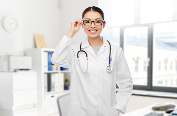 Image showing happy asian female doctor in glasses at hospital