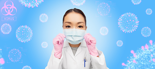 Image showing asian female doctor in medical mask and gloves