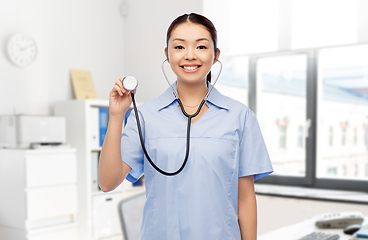 Image showing asian female doctor with stethoscope at hospital