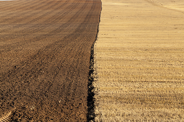 Image showing plowed half field