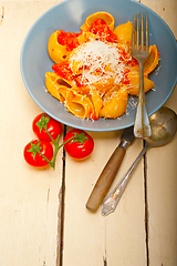 Image showing Italian snail lumaconi pasta with tomatoes