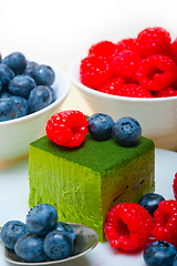 Image showing green tea matcha mousse cake with berries