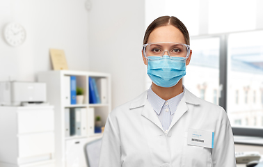 Image showing female scientist in medical mask and goggles