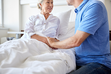 Image showing senior couple meeting at hospital ward