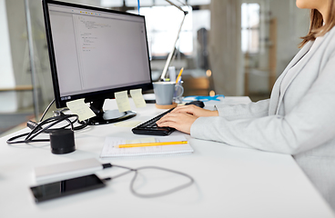 Image showing businesswoman with computer working at office