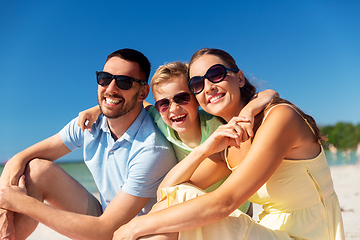 Image showing family hugging on summer beach