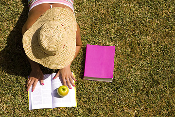 Image showing Studing at the school grass