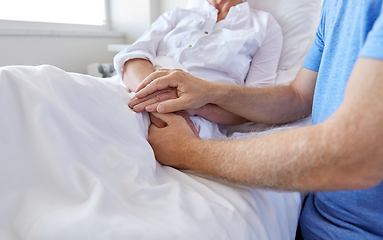 Image showing senior couple meeting at hospital ward