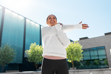 Image showing african american woman doing sports outdoors