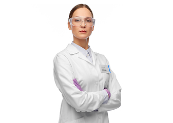 Image showing female scientist in goggles and gloves