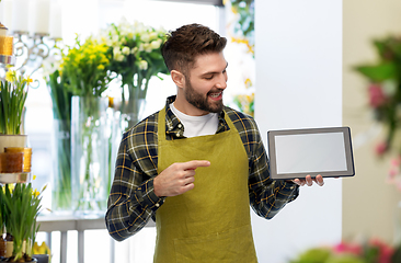 Image showing happy male gardener or farmer with tablet pc