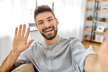 Image showing man taking selfie or having video call at home