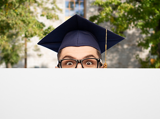 Image showing graduate student or bachelor behind white board