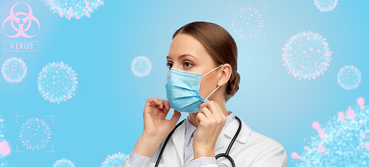 Image showing happy female doctor wearing medical mask