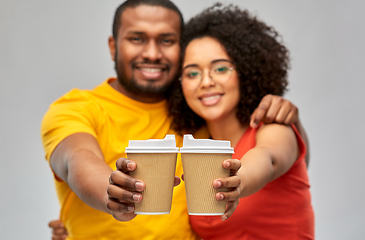 Image showing happy african american couple with coffee cups