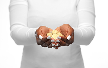 Image showing close up of african american woman holding money