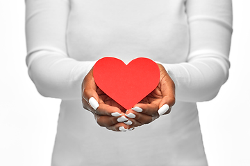 Image showing close up of african american woman with red heart