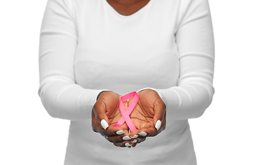 Image showing hands of woman with pink cancer awareness ribbon