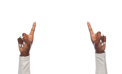 Image showing fingers of african american woman pointing up