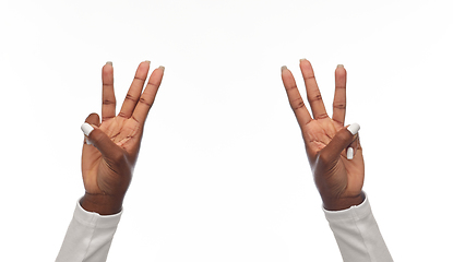 Image showing african american woman showing six fingers