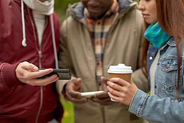 Image showing friends with smartphone and coffee outdoors