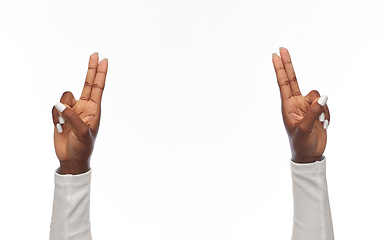 Image showing hands of african american woman showing fingers