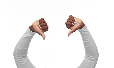 Image showing hands of african american woman with thumbs down
