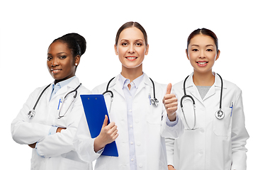 Image showing female doctors with clipboard showing thumbs up