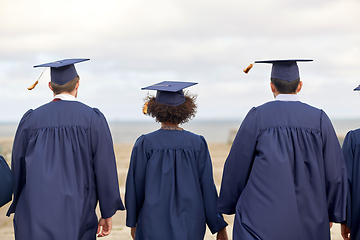 Image showing graduate students or bachelors in mortar boards