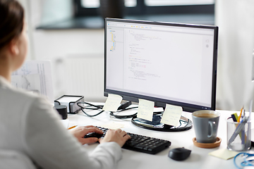 Image showing businesswoman with computer working at office