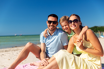 Image showing family hugging on summer beach