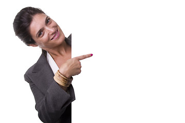 Image showing Businesswoman holding a billboard